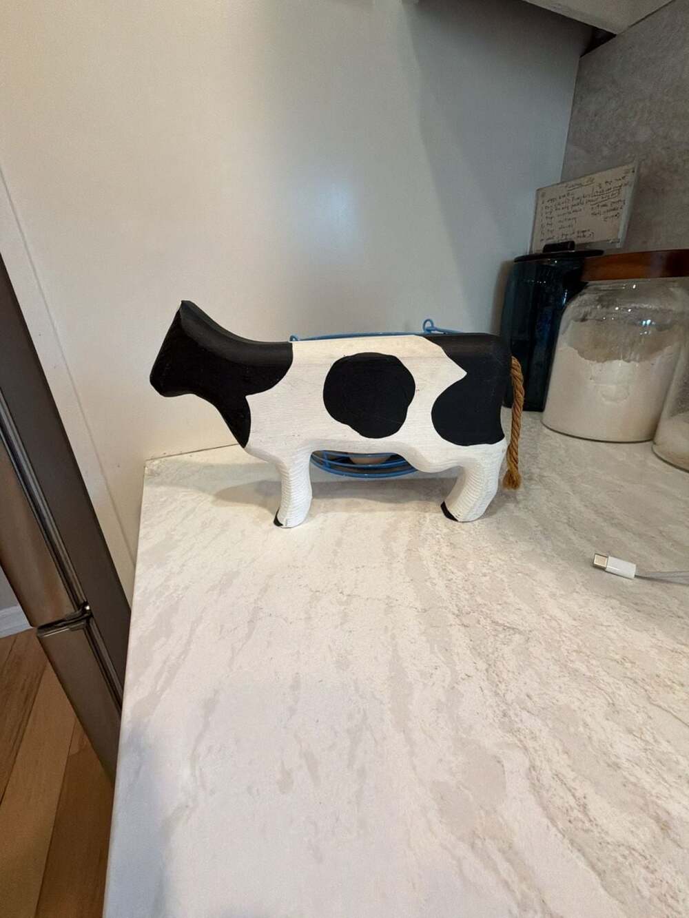 Vintage Hand-Painted Wooden Holstein Cow Figurine with Rope Tail